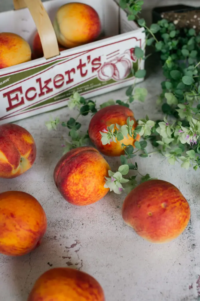 Eckert's Peaches and peach container close up