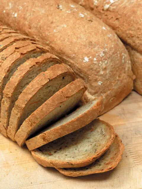 A picture of a sliced loaf of bread.