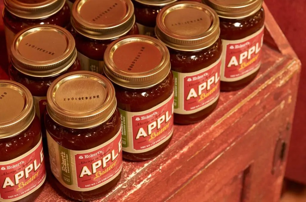 Eckert's Apple Butter jars lined up on the shelf.