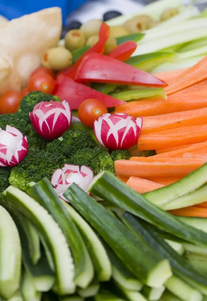 close up of Vegetable Tray including radish, carrots, olives, celery, etc.