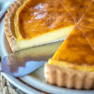 Custard Pie cut with pie slicer on plate.