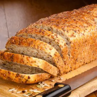 hummingbird bread sliced loaf on a wooden board.