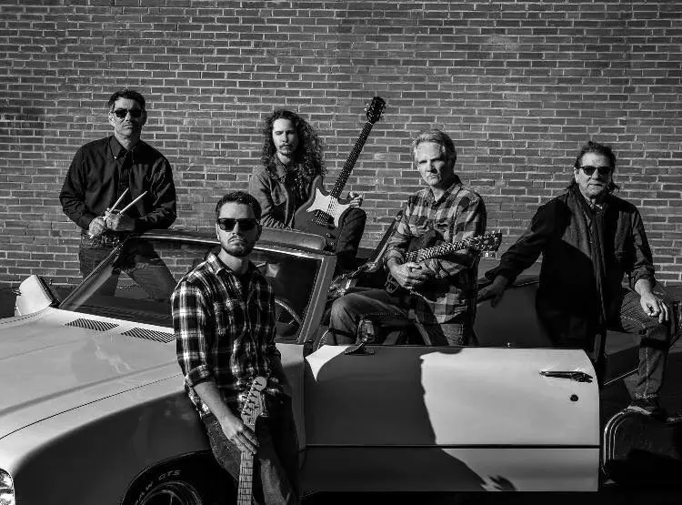 Cider Shed Live Music; Skylark Brothers Band. B&W in front of car