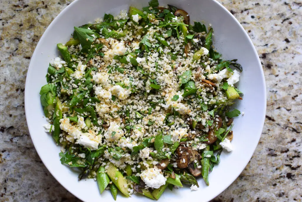 Warm Asparagus Salad with Mushrooms and Goat Cheese close up