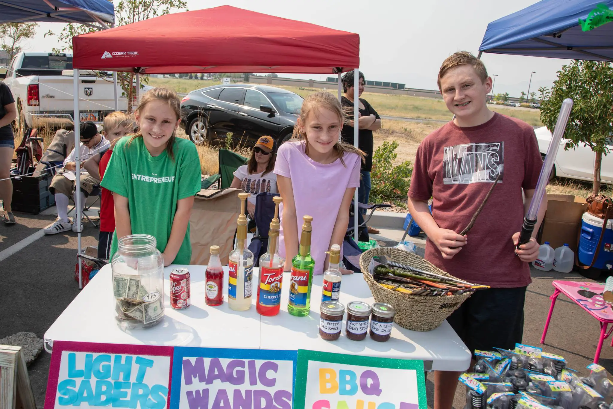 Belleville Farm Children's market. Three entrepenuers at outdoor table