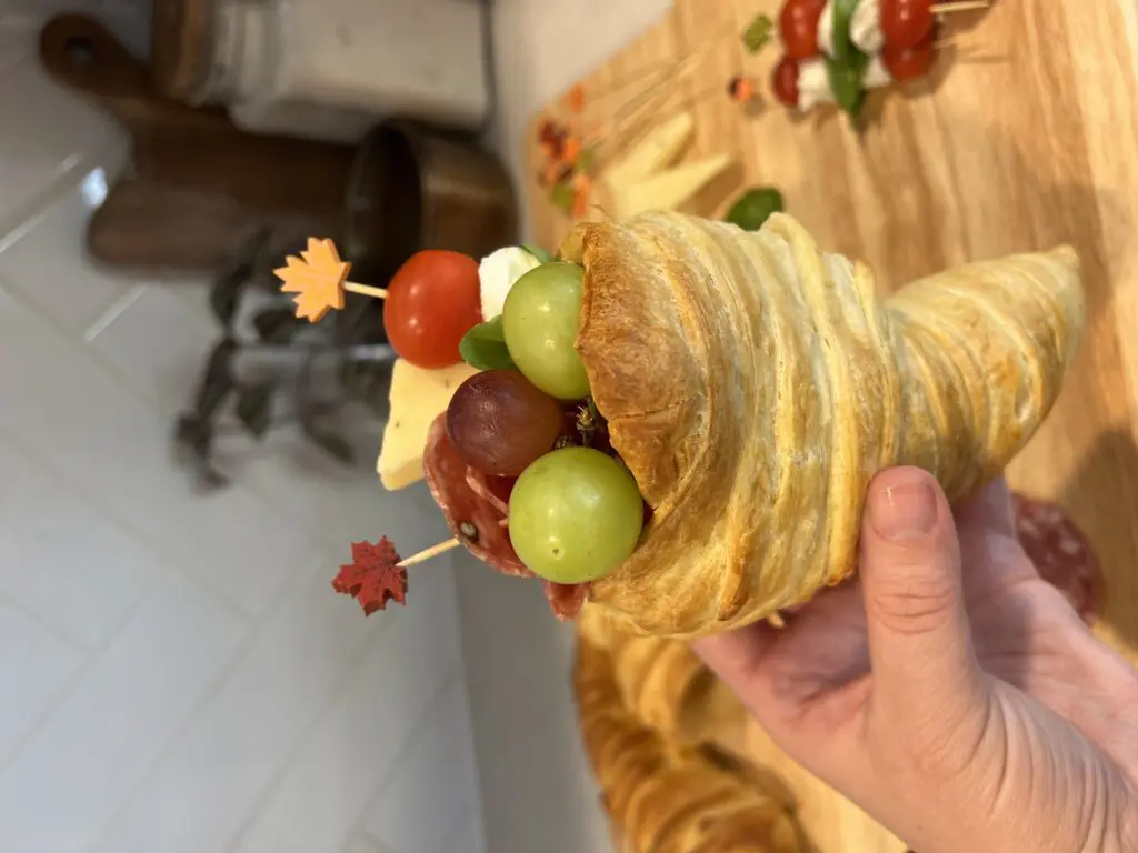 Cornucopia Charcuterie Cups - person holding