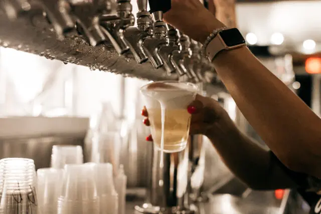 Cider Shed cider tap being poured into a cup from bar taps