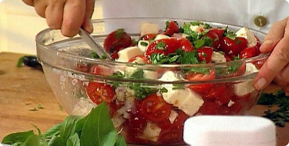 Mixing Tomato Feta Salad